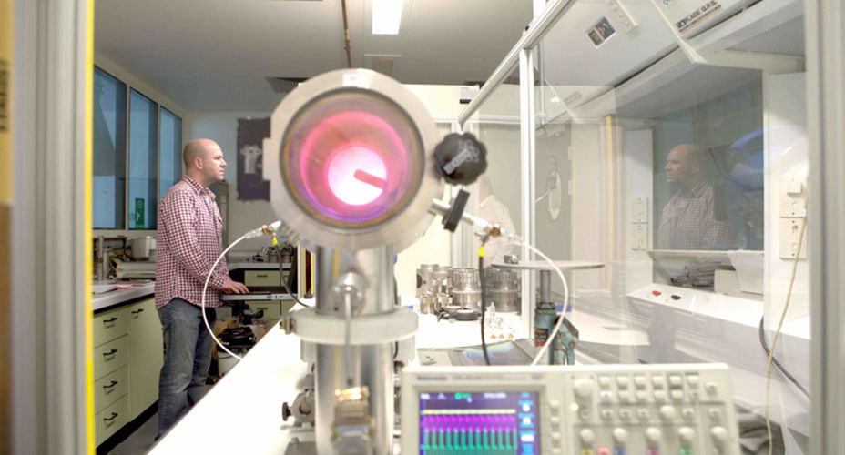 Physics | male in laboratory with machinery