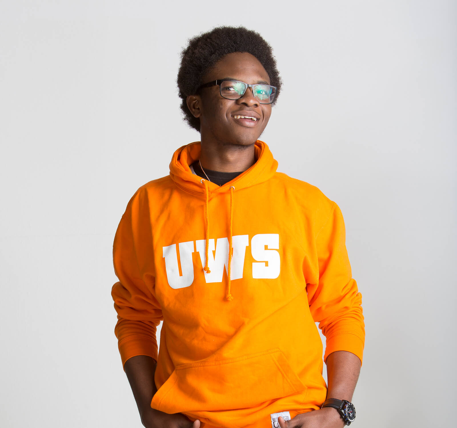 Student wearing orange UWS jumper