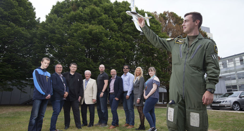 UWS Summer STEM academy group of staff and students with Pilot outside Paisley campus