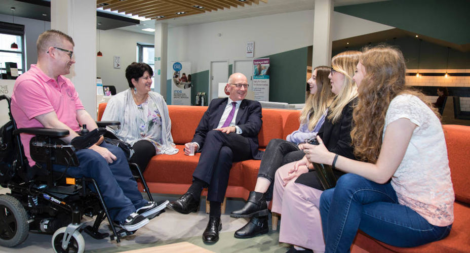 Deputy First Minister meeting UWS student on visit to Paisley Campus