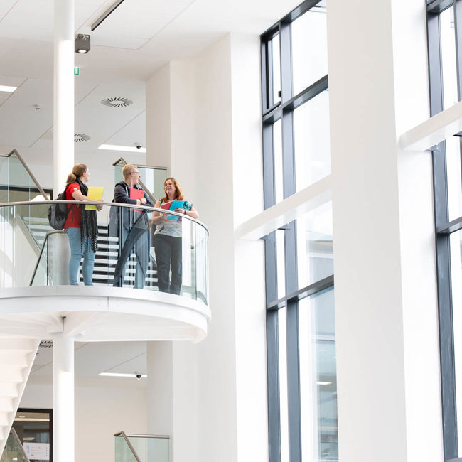 Students at the top of the stairs Lanarkshire Campus