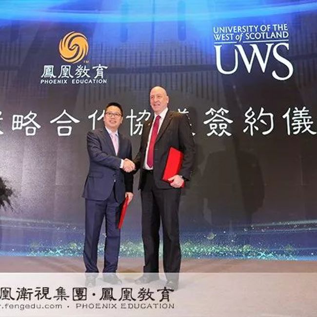 Representative of Phoenix Education with Prof. Craig Mahoney