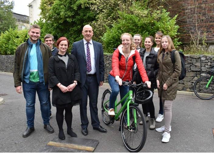 group of students with Principal and Brodie's Bike 