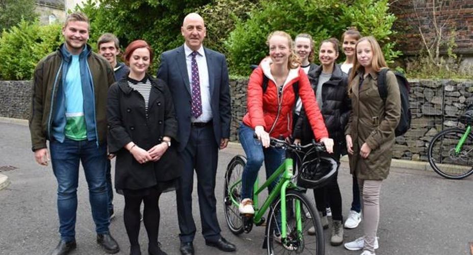 group of students with Principal and Brodie's Bike