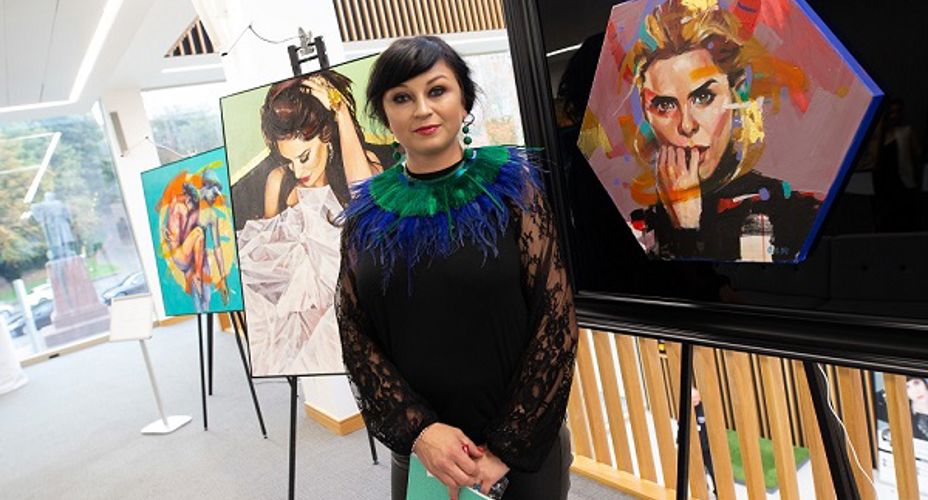 Artist Dominika with some of her artwork