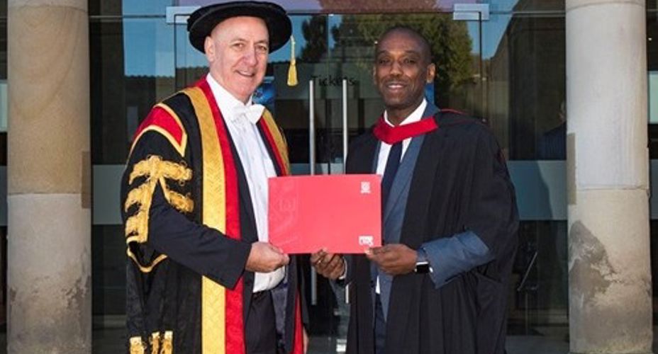 junior-mendes-and-craig-mahoney with graduation certificate