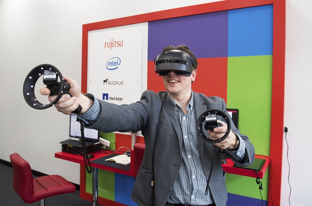  Person trying VR head ware UWS Fujitsu Innovation Hub launch