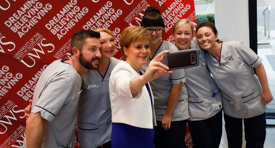 First Minister with Nursing students taking selfie