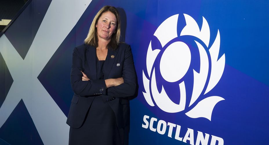 Dee Bradbury beside Scottish Rugby logo