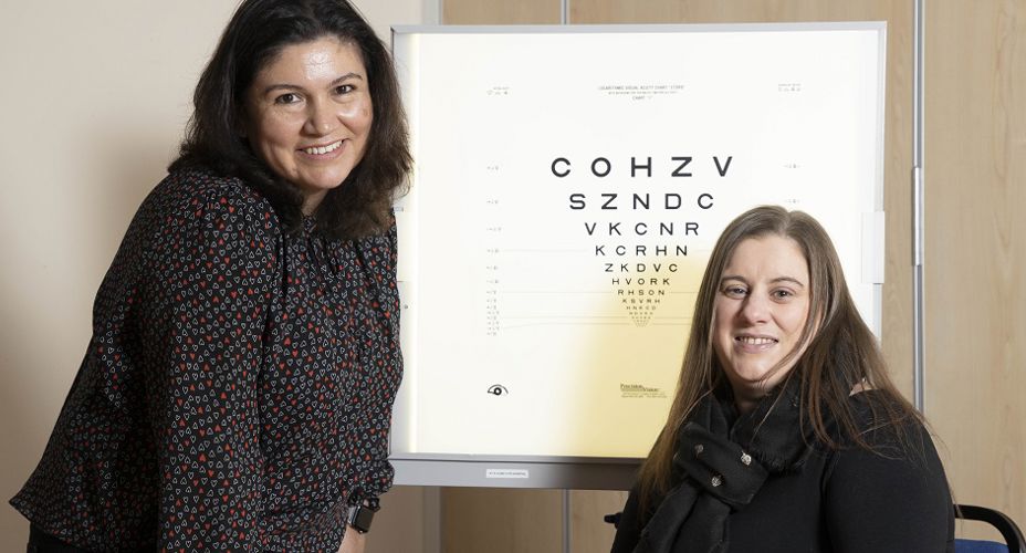 Fiona Henriquez with person in front of board
