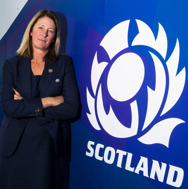 Dee Bradbury beside Scottish Rugby logo