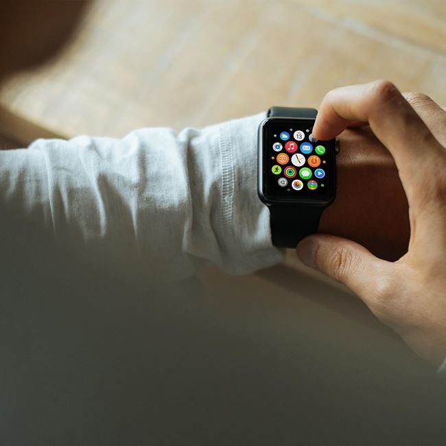 Image of a person wearing an apple watch