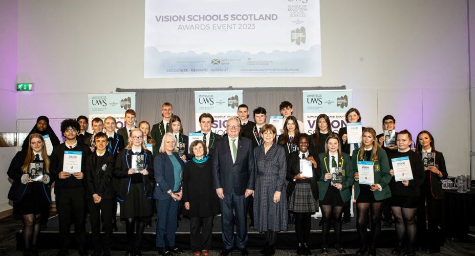 Pupils from schools in Vision Schools Programme on stage at the awards ceremony